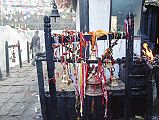 408 Muktinath Chumig Gyatsa Bells and Candles Next To Temple Entrance